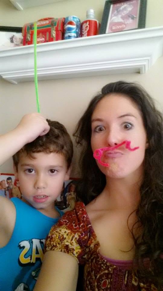 Nanny and child being silly together